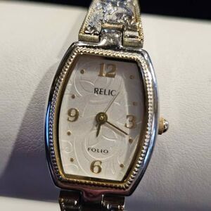 Vintage Relic ladies silvertone watch with southern style band.